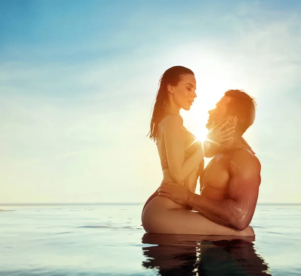 Appealing naked babes are relaxing on the beach